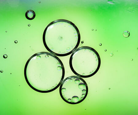 Oil drops on a water surface,Green の写真素材