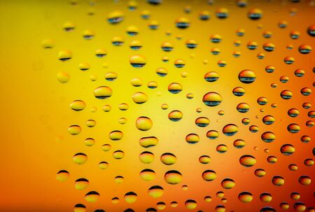 Background of water drops on glassの写真素材