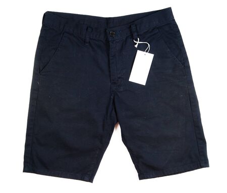 Trousers with tagging on white backgroundの写真素材