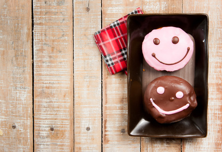 Sweet donut for a great morning breakfast on woodの写真素材
