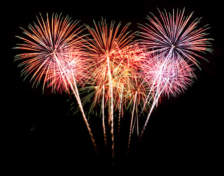 Colorful fireworks on the black sky backgroundの写真素材