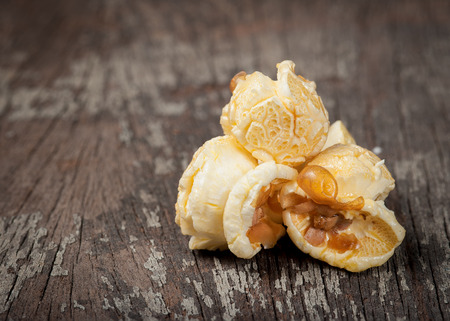 Popcorn on wooden tableの写真素材