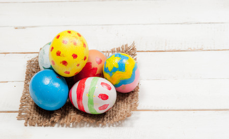 Easter eggs on wooden background
