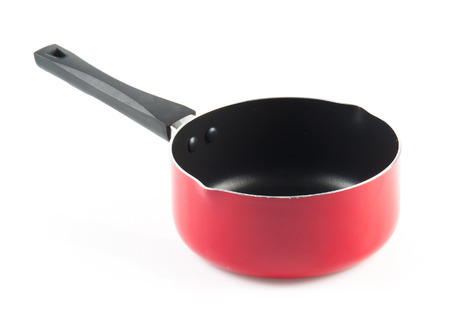 Red frying pan isolated on white backgroundの写真素材