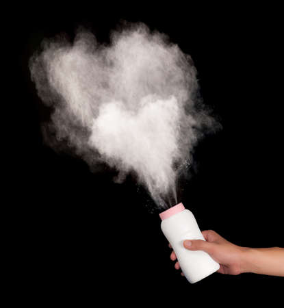 spilled powder on black backgroundの写真素材