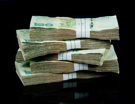 Thai money 20 baht on black background