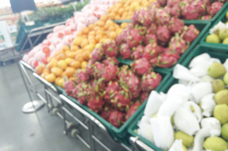 Blur fruits shelf in supermarket backgroundの写真素材