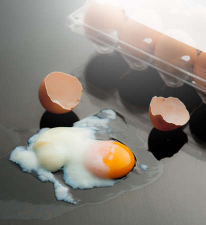 soft-boiled egg on reflected glass background