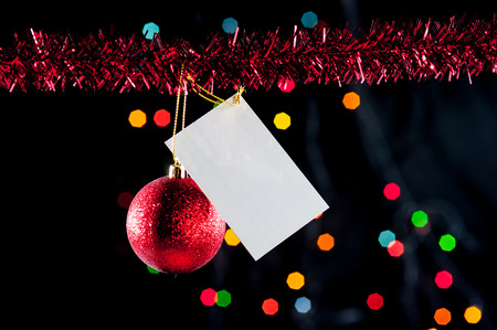 Christmas ball on christmas bokeh lights as backgroundの写真素材