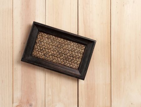 square wood tray on table wood, top viewの写真素材