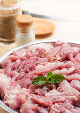 fresh raw pork with spicesの写真素材