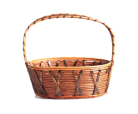 Empty wicker basket isolated on whiteの写真素材