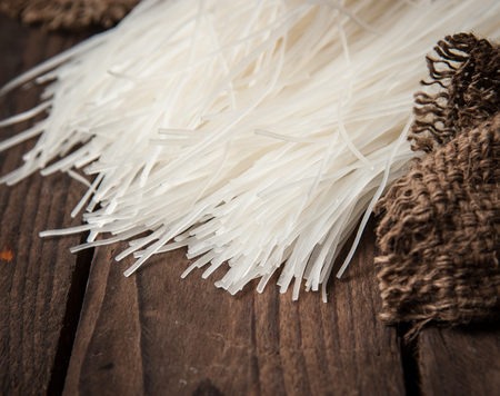 Rice noodles on wood backgroundの写真素材