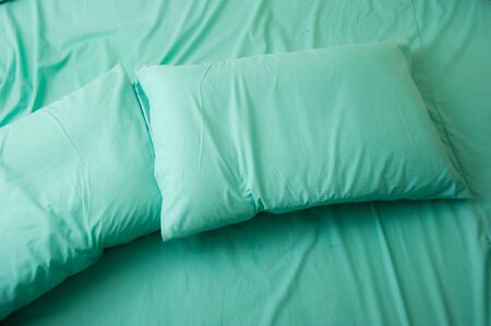 Pillow on the bed, background