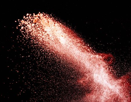 Red Flour on dark background,Motion blur