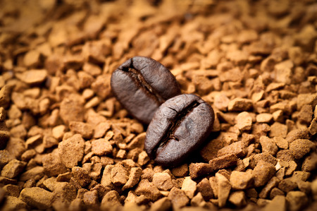 Coffee bean on ground coffee background.の写真素材