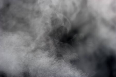 Abstract steam on a black backgroundの写真素材