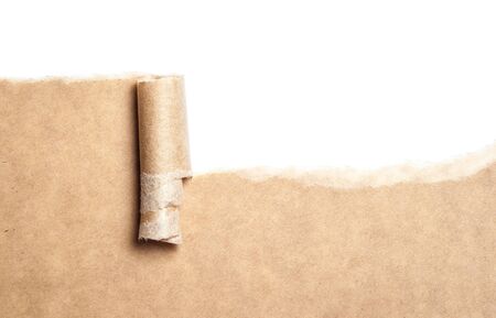 Blank torn brown paper with space for text on white background,copy spaceの写真素材