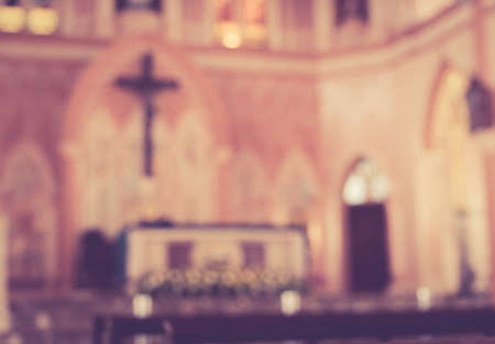 blurred vintage photo of church interior for abstract backgroundの写真素材