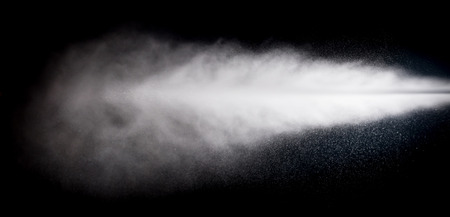 water spray of high pressure water jet on black backgroundの写真素材