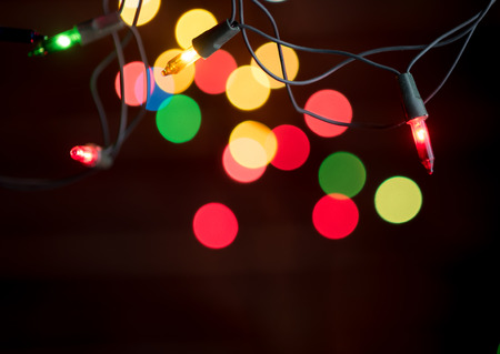 Christmas lights over on dark background