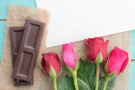 Valentine's day background with chocolate rose flower and empty space for lovely messageの写真素材