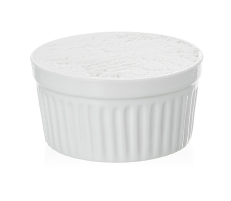 Bowl of white flour isolated on white background