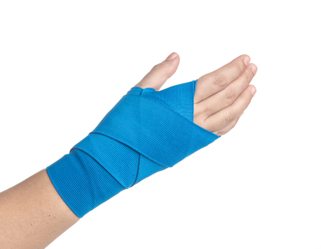 Hand wrapped in elastic bandage on white background,hand painの写真素材