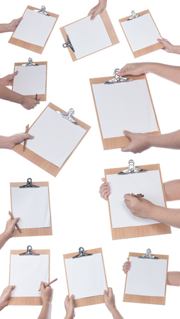 Collection of hand holding clipboard with blank white paper and pen isolated on whiteの写真素材