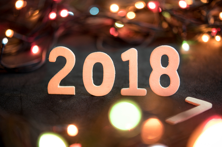 New year 2018,word of 2018 with blurred color lights bokeh bacground