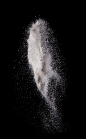 Washing powder explosion isolated on over dark background,Motion blurの写真素材