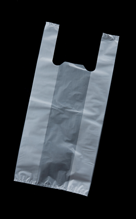 White plastic bag isolated on black backgroundの写真素材