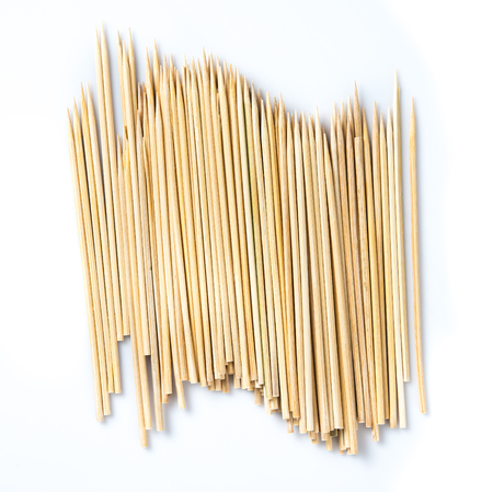 Sticks for canape and kebab on white backgroundの写真素材