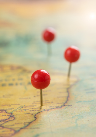Pushpin on a tourist map,Travel conceptの写真素材