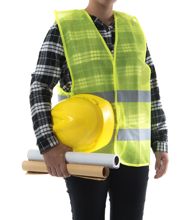 Construction concept,Asian engineer woman holding yellow helmet and blue print paper isolated on whiteの写真素材