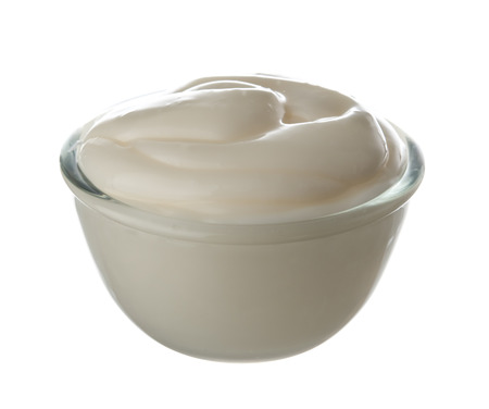Mayonnaise sauce in bowl isolated on whiteの写真素材