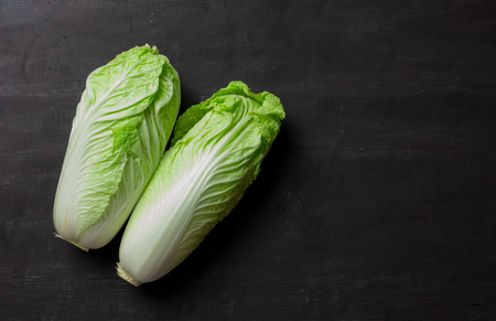 Romain lettuce on wooden table,Top viewの写真素材