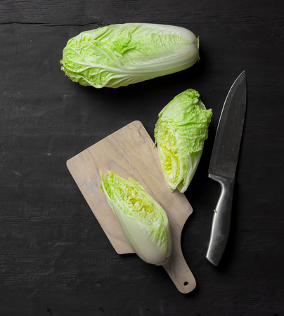 Romain lettuce on kitchen boardの写真素材