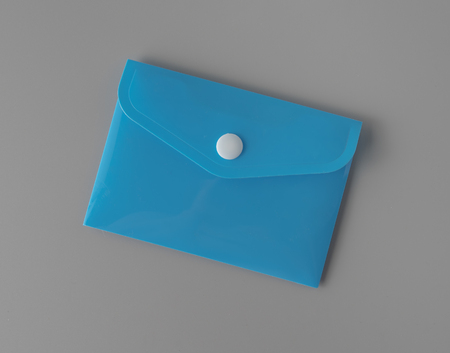 Closed Blue Empty envelope for letters and documents on grey background for print design and mock upの写真素材