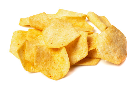 Tasty crispy potato chips isolated on white backgroundの写真素材