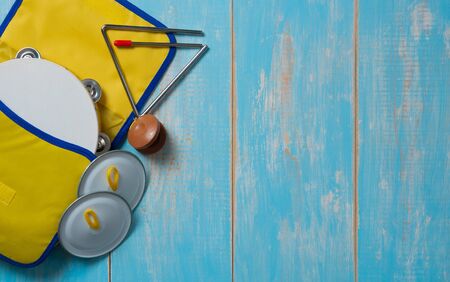 Set of rhythm tambourine, metronome,cymbals on wood table,Music festival and study and school...