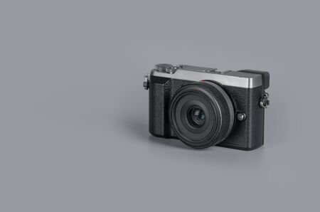 Vintage camera on gray background with copy space,Concept photographer