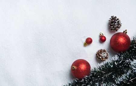Christmas decoration with balls on snow with copy spaceの写真素材