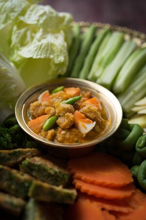 Nam prik or chili paste with boiled various vegetables,Thai foodの写真素材
