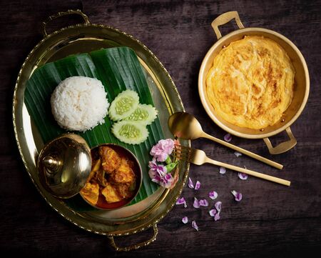 Street food on traditional:Rice with yellow curry snapper fish,Thai foodの写真素材
