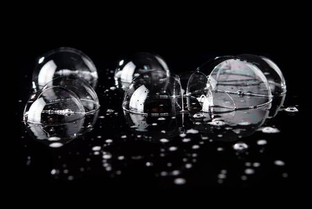 Soap bubbles on black background.の写真素材