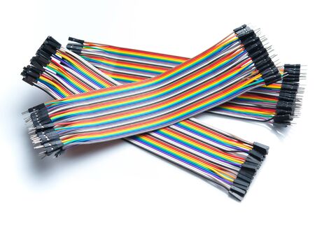 Connector Pins of colorful ribbon cable on white background