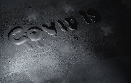 Coronavirus outbreak in 2019, water drops are literally COVID 19 on dark