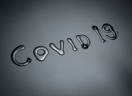 Coronavirus outbreak in 2019,water drops are literally "COVID 19" on darkの写真素材