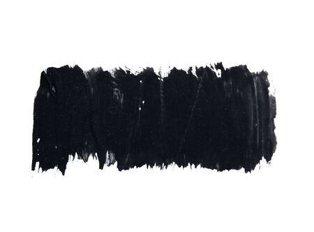Black paint brush stroke texture ochre watercolor isolated on a white backgroundの写真素材